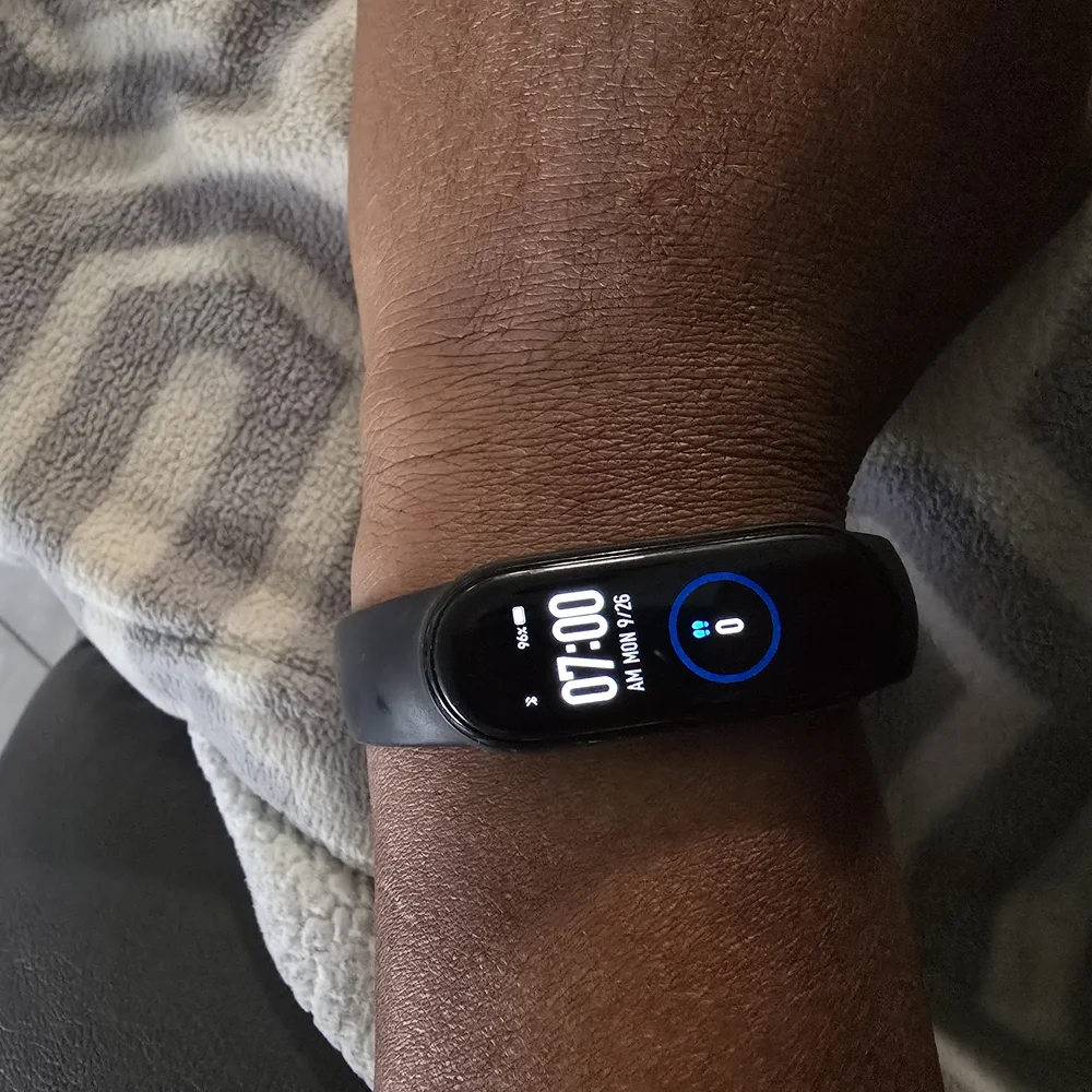 Smart Fitness Tracker with Black Band W/Charge Cable.